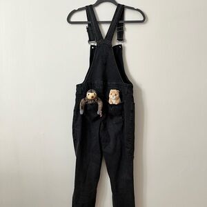 Black ripped overalls
